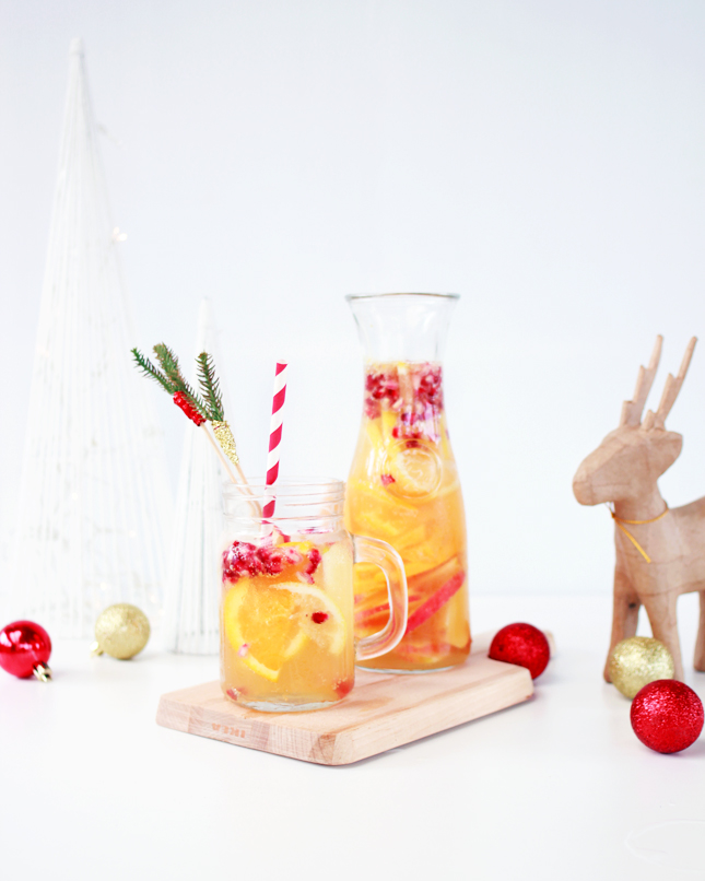 Get boozy on Christmas Day with some  Apple Cider White Sangria - it's just fancy punch!